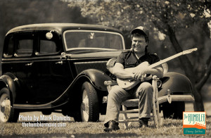 Danny Gatton with his 1953 Telecaster and his 1934 Ford at his farm in Newburg, April 1990.